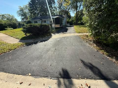 Fresh asphalt driveway installed by G&D Construction in Lake County, IL